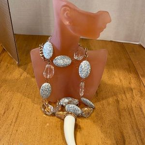 Funtime Faux lucite horn with faux beads and earrings! New , store ticket Luck